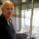AgriProtein founder Jason Drew next to one of the fly cages at a fly factory.